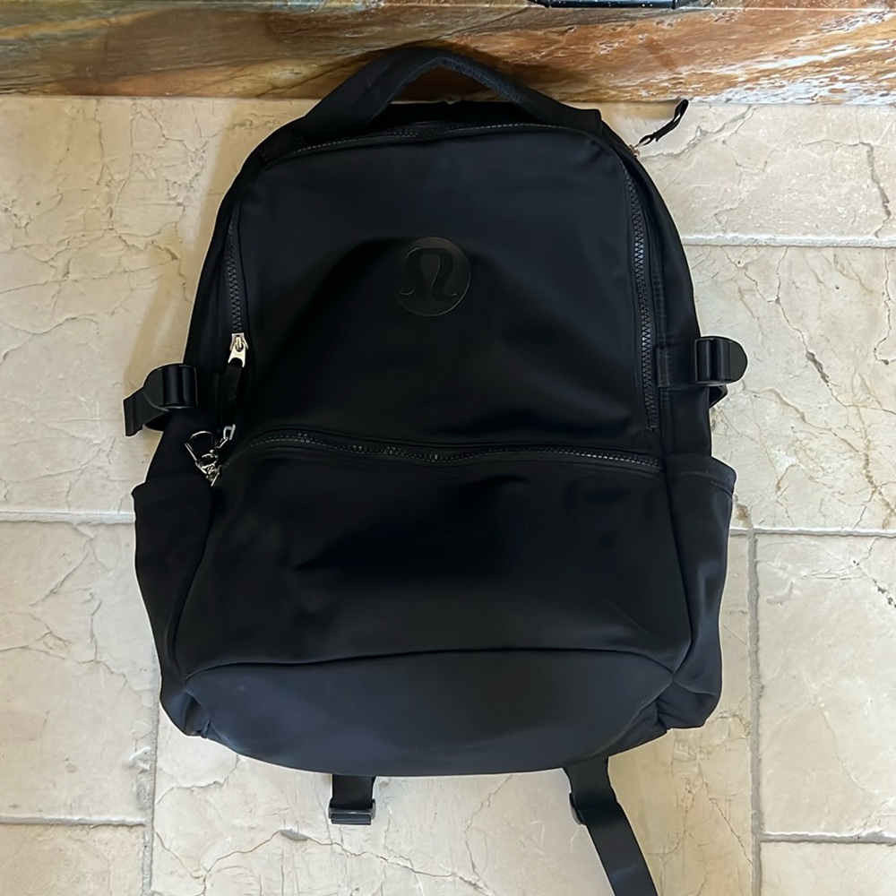 Lululemon “New Crew” 22L Backpack. Black. Missing keychain pull. Used 3x.